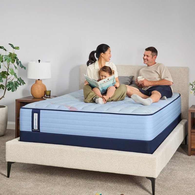 Sealy Fayette Spring Mattress showing a plush, supportive mattress with a quilted top in a bedroom setting.