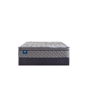 Sealy Opal House innerspring mattress with plush top and supportive coils, shown in a modern bedroom setting.