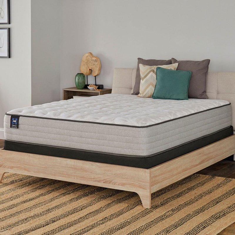 Sealy Leahy Innerspring Mattress with plush top and supportive coils, shown in a bedroom setting.