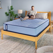Sealy Maida Spring Mattress showing a plush, supportive mattress with a quilted surface in a bedroom setting