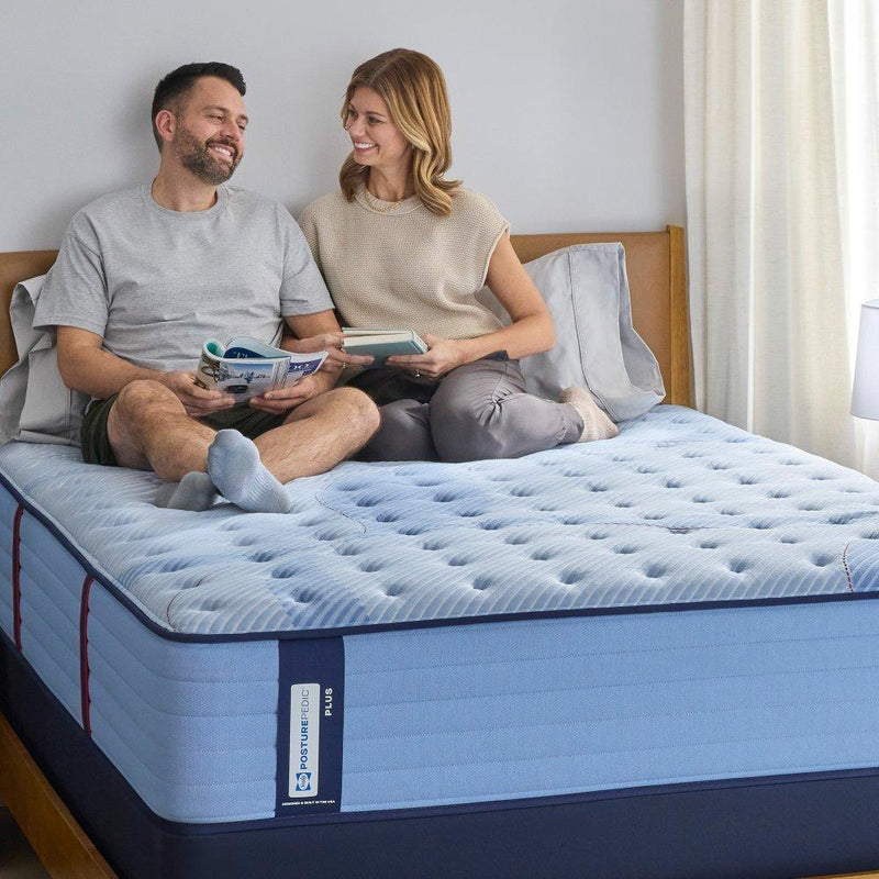 Sealy Newland Spring Mattress with plush fabric cover and supportive foam layers, designed for comfort and restful sleep.