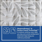 Sealy Lavina II innerspring mattress with quilted top and supportive coils, shown on a bed with neutral bedding.