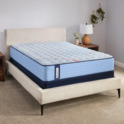 Sealy Fayette Spring Mattress showcasing a plush, supportive mattress with a quilted top in a bedroom setting.