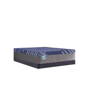Sealy Royal Oaks Hybrid Mattress with plush top, foam and innerspring layers, shown in a bedroom setting.