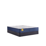 Sealy Stately innerspring mattress with plush top and supportive coils, shown in a neutral bedroom setting.