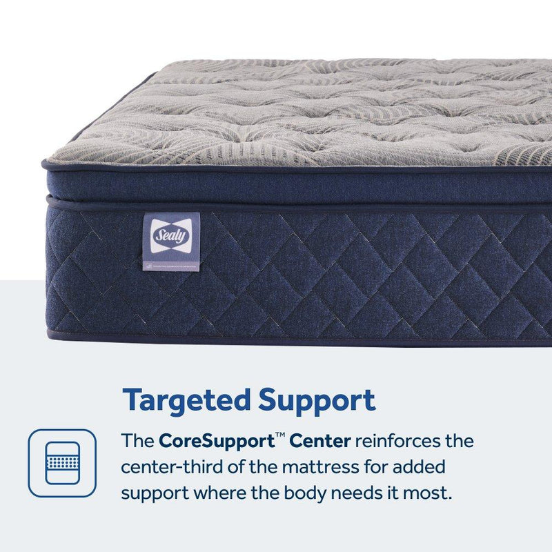 Sealy Moreland Ave Spring Mattress with plush surface and supportive design, shown in a neatly made bed setting.