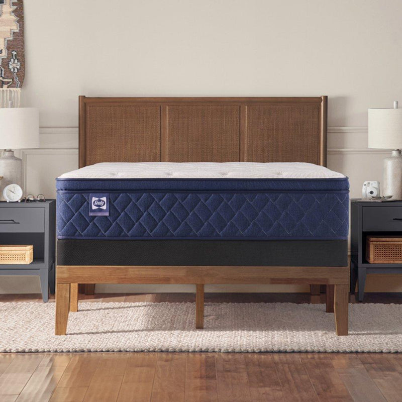 Sealy Safa Park Spring Mattress with plush fabric cover and supportive spring construction, displayed on a bed.