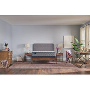 Sealy Sixth & Park innerspring mattress with quilted top and supportive coil system, shown on a bed frame.