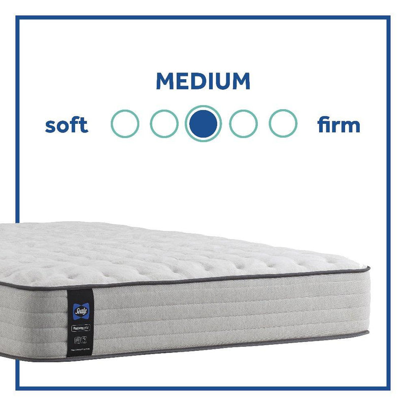 Sealy Garner II innerspring mattress with quilted top, showcasing plush surface and supportive springs for a comfortable sleep.