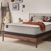 Sealy Innerspring Mattress with plush fabric cover, showing the side profile and supportive coil system for comfortable sleep.
