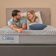 Sealy Lacey Hybrid Mattress with plush top layer and supportive base, featuring a sleek fabric cover and modern design.