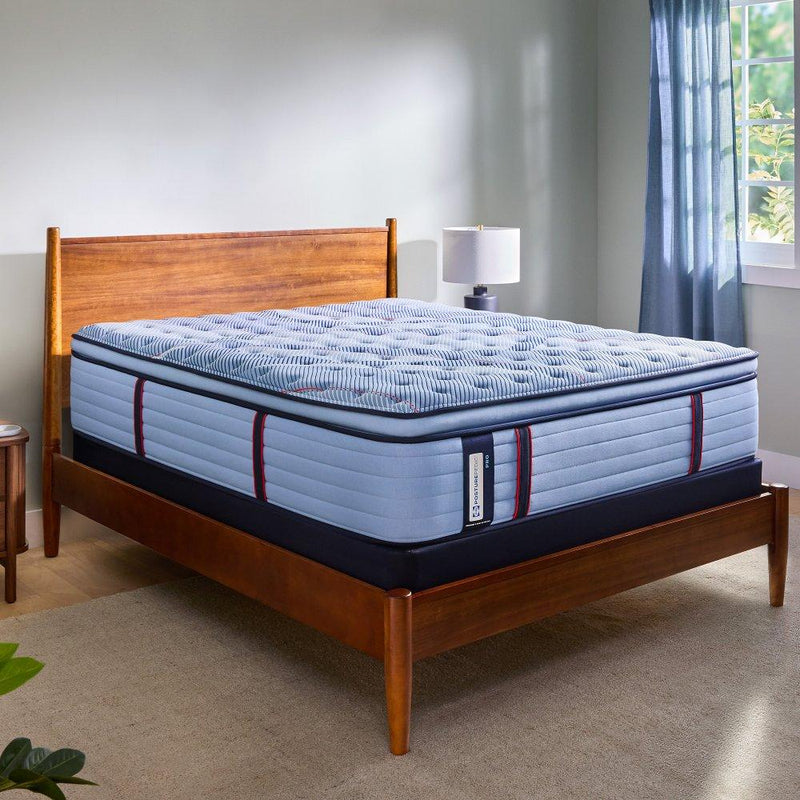 Sealy Reno Spring Mattress with plush fabric cover and supportive spring system, designed for comfortable sleep.