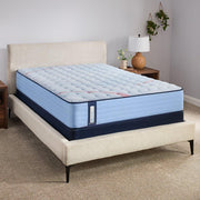 Sealy Fayette Spring Mattress showcasing a plush, supportive mattress with a quilted top and Sealy branding.