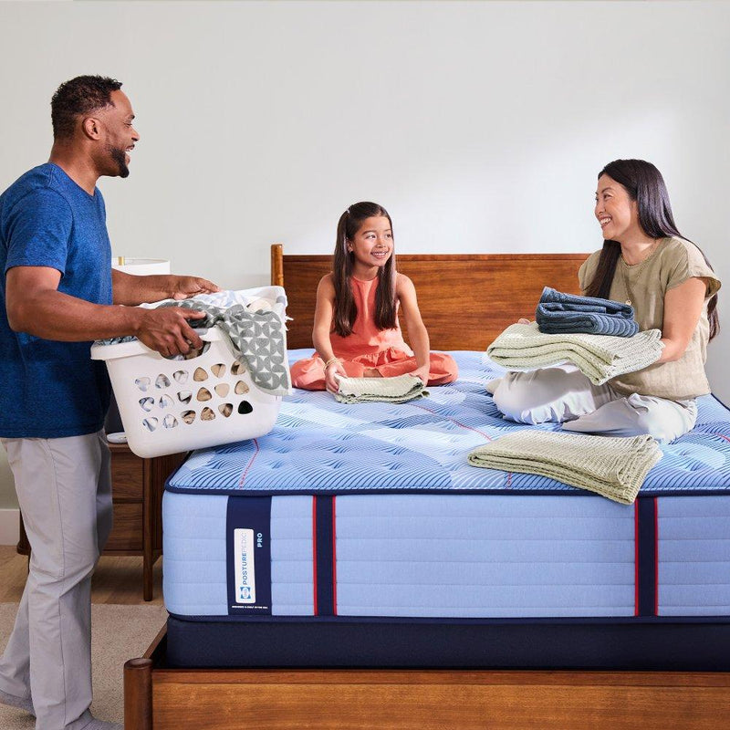 Sealy Reno Spring Mattress showing a plush, supportive mattress with a quilted top and Sealy branding, designed for comfort.