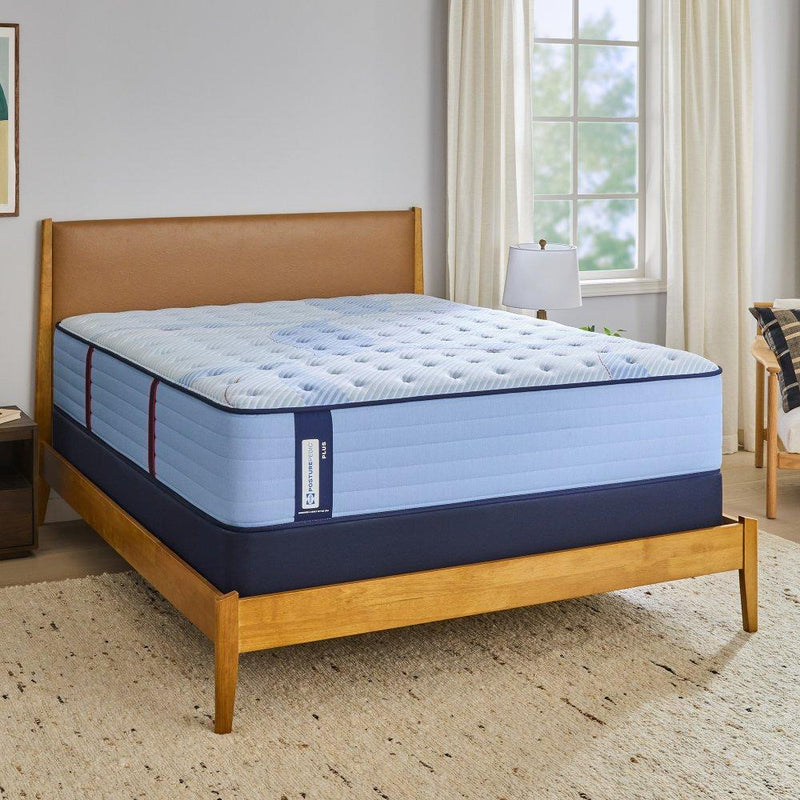 Sealy Newland Spring Mattress with plush fabric cover and supportive foam layers, designed for comfortable sleeping.