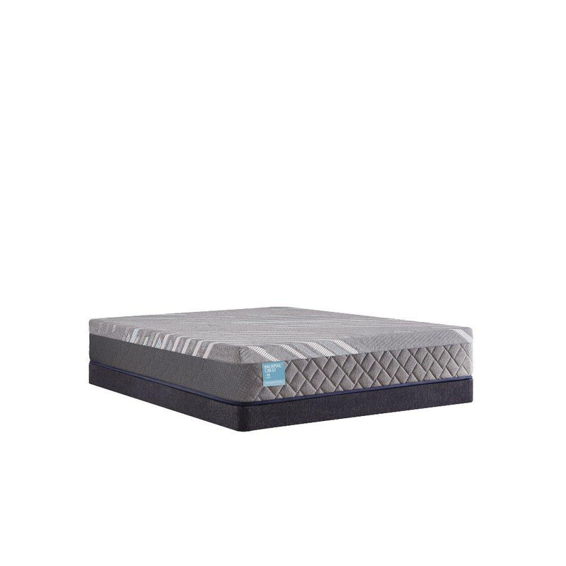Sealy Remey Hybrid Mattress with quilted top and supportive layers, shown on a bed frame for comfortable sleeping.
