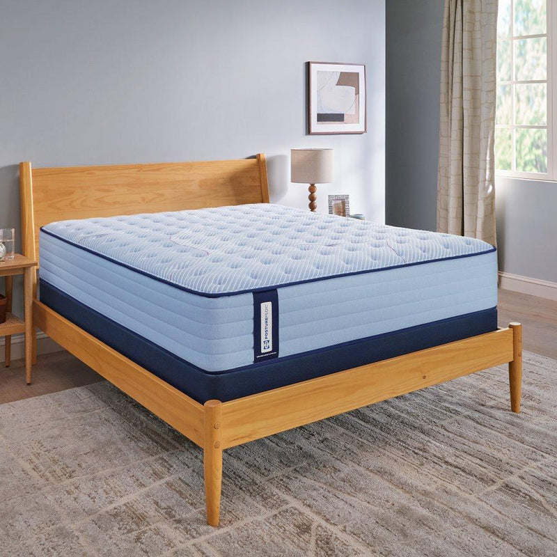 Sealy Maida Spring Mattress with quilted top, showing a plush, supportive sleeping surface in a well-lit bedroom setting.
