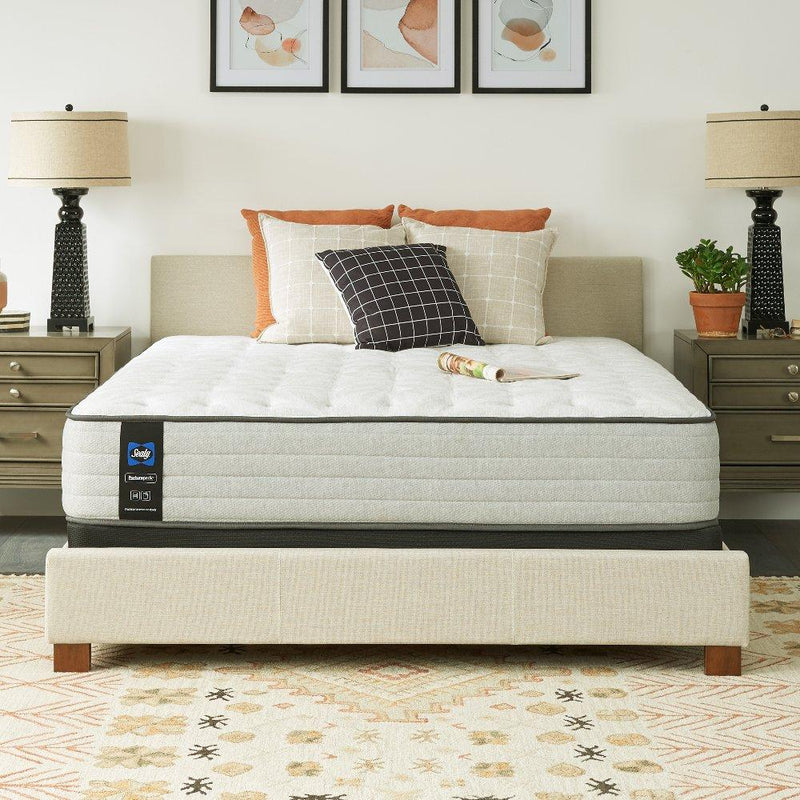Sealy Garner II innerspring mattress with plush top and supportive coils, ideal for comfortable sleep in a modern bedroom setting.