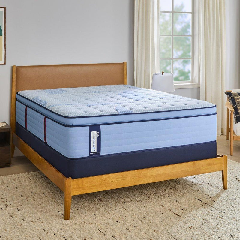 Sealy Newland Spring Mattress with plush fabric cover and supportive layers, designed for comfortable sleep.