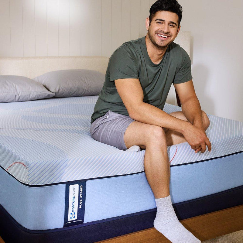 Sealy Lovato Hybrid Mattress with plush fabric cover and layered foam and coil support system for comfort.