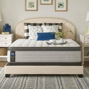 Sealy Garner II innerspring mattress with white quilted top and supportive edge, designed for comfort and durability.