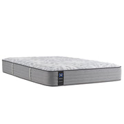 Sealy Lavina II innerspring mattress with plush top surface and supportive coils, shown in a bedroom setting.