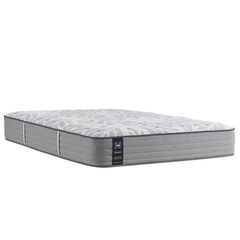 Sealy Lavina II innerspring mattress with plush top surface and supportive coils, shown in a bedroom setting.