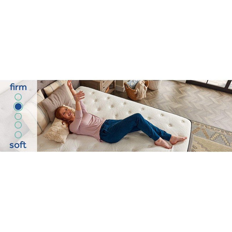 Sealy Spruce Innerspring Mattress with quilted top and supportive coils, shown with clean white bedding for a comfortable sleep surface.