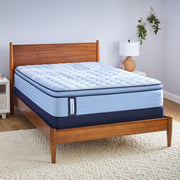 Sealy Kennett Spring Mattress showing a plush, quilted surface with supportive edge details and a neutral fabric cover.