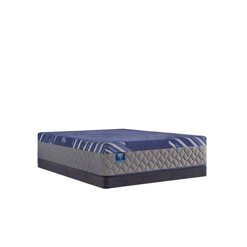 Sealy Grand Jewel Hybrid Mattress showing plush top surface, layered construction, and supportive edges in a well-made bed setup.