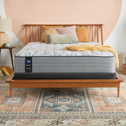 Sealy Lavina II innerspring mattress with quilted top and supportive coils, showcasing a plush, comfortable sleeping surface.