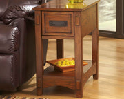 Ashley Furniture Breegin chairside end table with a wooden surface and tapered legs, designed for convenient side table use.