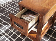 Ashley Furniture Breegin chairside end table with a wooden top and storage shelf, perfect for living room or bedroom use.