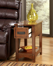 Ashley Furniture Breegin chairside end table with open shelving, featuring a sleek wood finish and modern design.