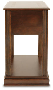 Ashley Furniture Breegin chairside end table with a dark wood finish and a single open shelf, shown from the back side.