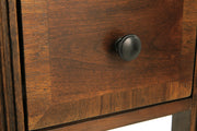Ashley Furniture Breegin chairside end table with a wooden top and metal frame, perfect for next to a sofa or chair.