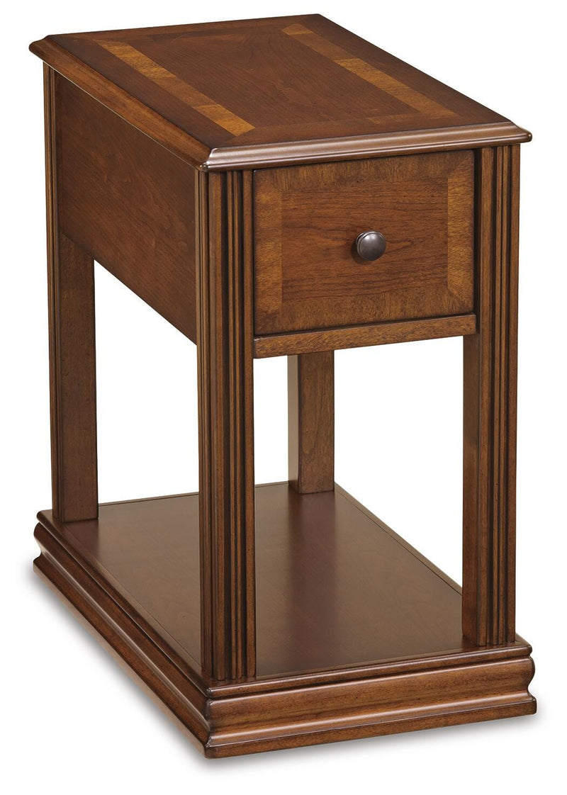 Ashley Furniture Breegin chairside end table with a dark wood finish and a compact, functional design for living room use.