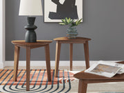 Set of three Ashley Furniture Lyncott tables, modern design with wooden finish, arranged together on a neutral background.