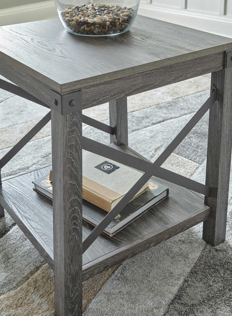 Ashley Furniture Freedan End Table showing a stylish wooden surface with a modern design and tapered legs.