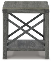 Ashley Furniture Freedan End Table with a sleek wooden surface and modern design, shown in a cozy living room setting.