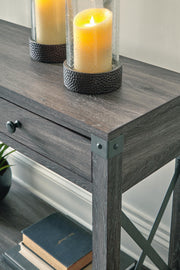 Ashley Furniture Freedan sofa table showcasing a sleek wooden console with modern design and detailed craftsmanship.