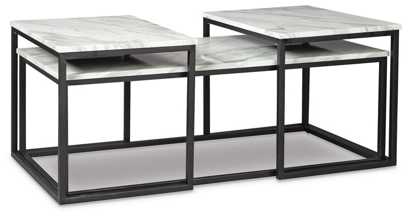 Set of three Ashley Furniture Donnesta tables with angled nesting design, shown from an angled side view.
