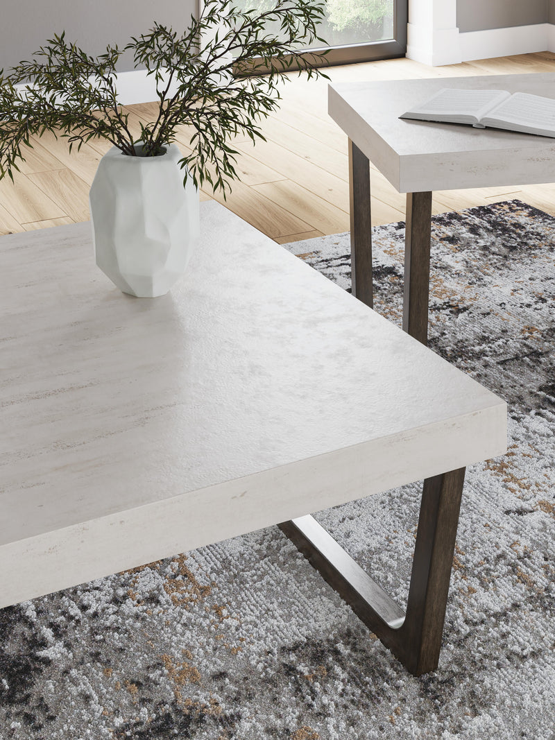 Set of two Ashley Furniture Westenfort Tables, 3-pack, featuring modern wooden tops and sturdy metal legs.