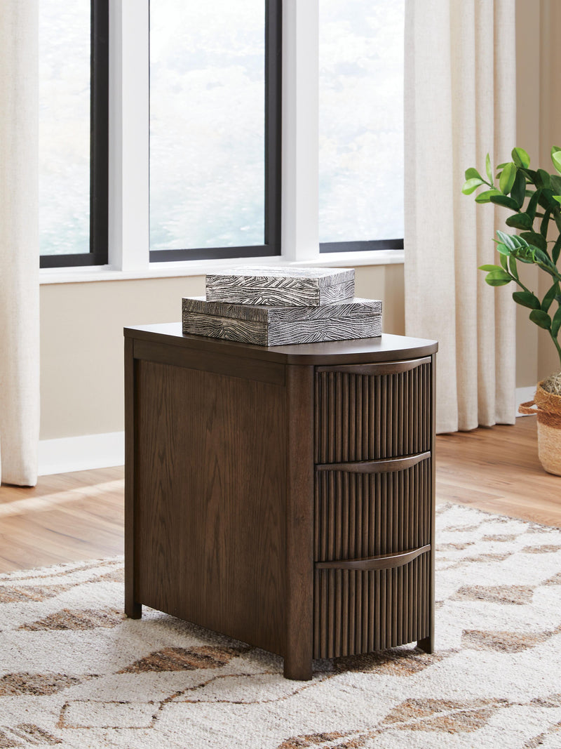Ashley Furniture Camdill chairside end table with wooden top and storage shelf, perfect for small living room spaces.
