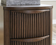 Ashley Furniture Camdill chairside end table with a wooden finish and compact design, ideal for small living spaces.