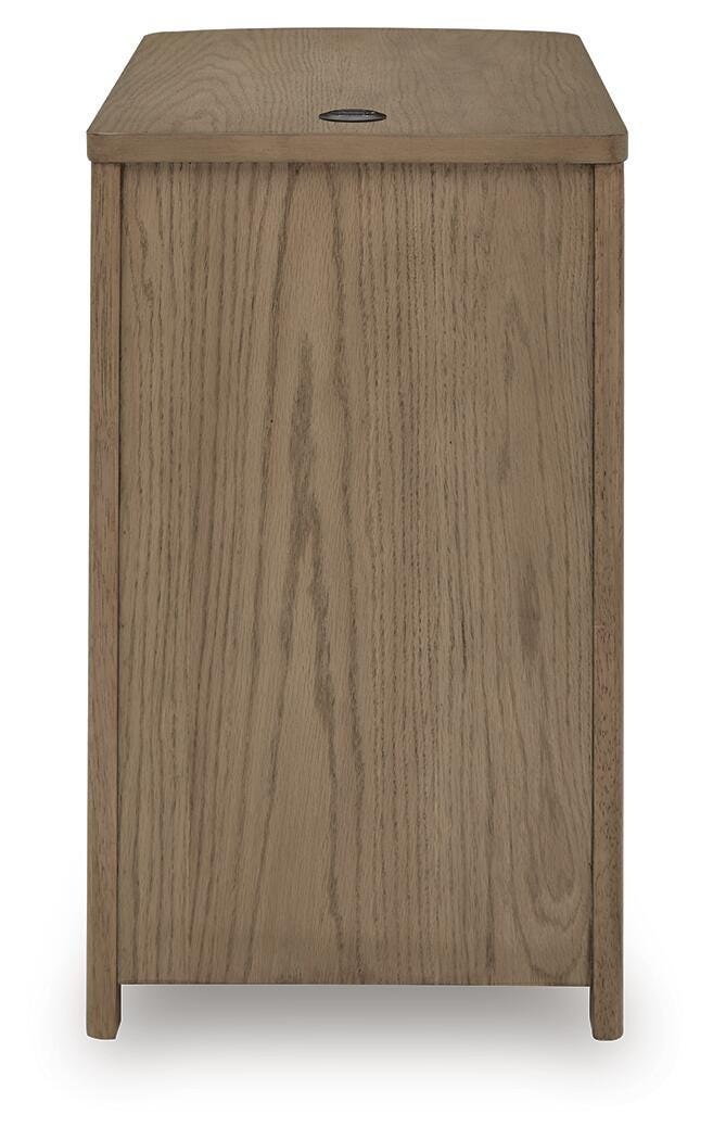 Ashley Furniture Camdill chairside end table with dark wood finish, featuring a compact design and storage drawer.