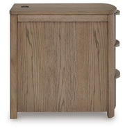 Ashley Furniture Camdill chairside end table with a dark wood finish and a single drawer, designed for living room use.