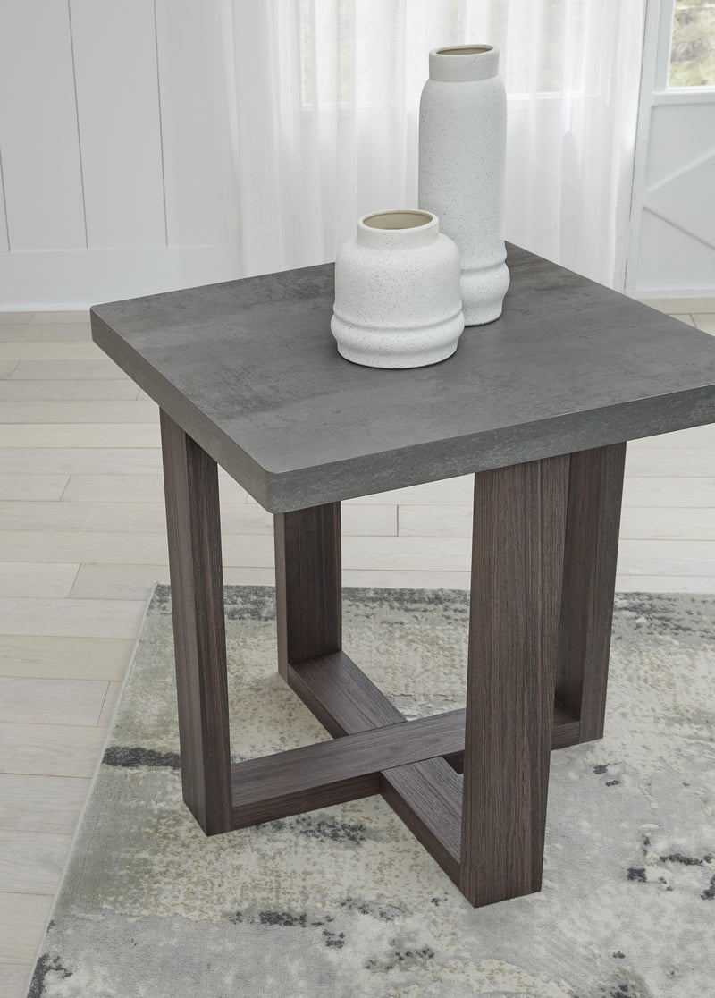 Set of three Ashley Furniture Dynnford tables with detailed wood finish and modern design, ideal for living room decor.