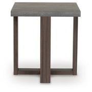 Set of three Ashley Furniture Dynnford tables, side view showing wood finish and sleek design, arranged together in a living room setting.