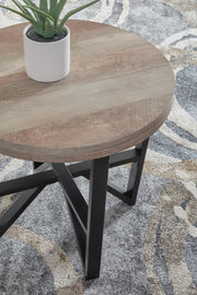 Set of three Ashley Furniture Deanlee tables, featuring detailed wooden surfaces and modern design for living room decor.